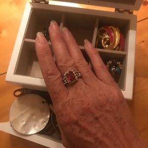 Ring stamped 925 probably garnet with sapphire, missing 2 stones.